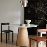 Load image into Gallery viewer, Modern Round Dining Table with Walnut Veneer Top & Travertine-Inspired Pedestal Base