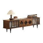 Load image into Gallery viewer, Wooden entertainment console with decorative elements on a white background
