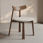 Load image into Gallery viewer, Modern Minimalist Dining Chair Solid Wood Frame with Curved Backrest &amp; Soft Faux Leather Seat
