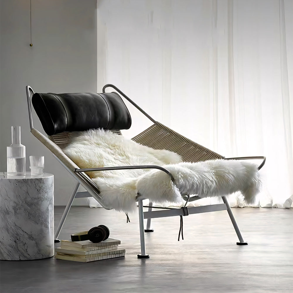Modern Lounge Chair with Wool Throw and Leather Head Pillow