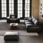 Load image into Gallery viewer, Modern Low Profile Black Leather Straight Sofa Minimalist Wide Arm 4 Seater Couch
