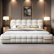 Luxurious Soft Upholstered Bed with Elegant Gold Accents