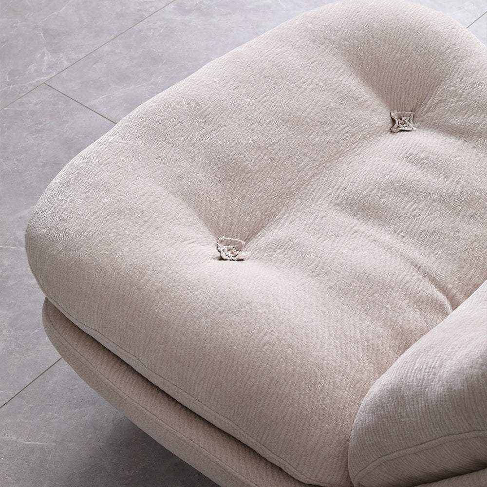 Modern Low Lounge Chair with Plush Cushioning and Rounded Silhouette