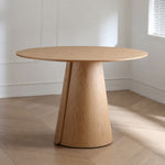 Load image into Gallery viewer, Modern Round Dining Table with Walnut Veneer Top &amp; Travertine-Inspired Pedestal Base
