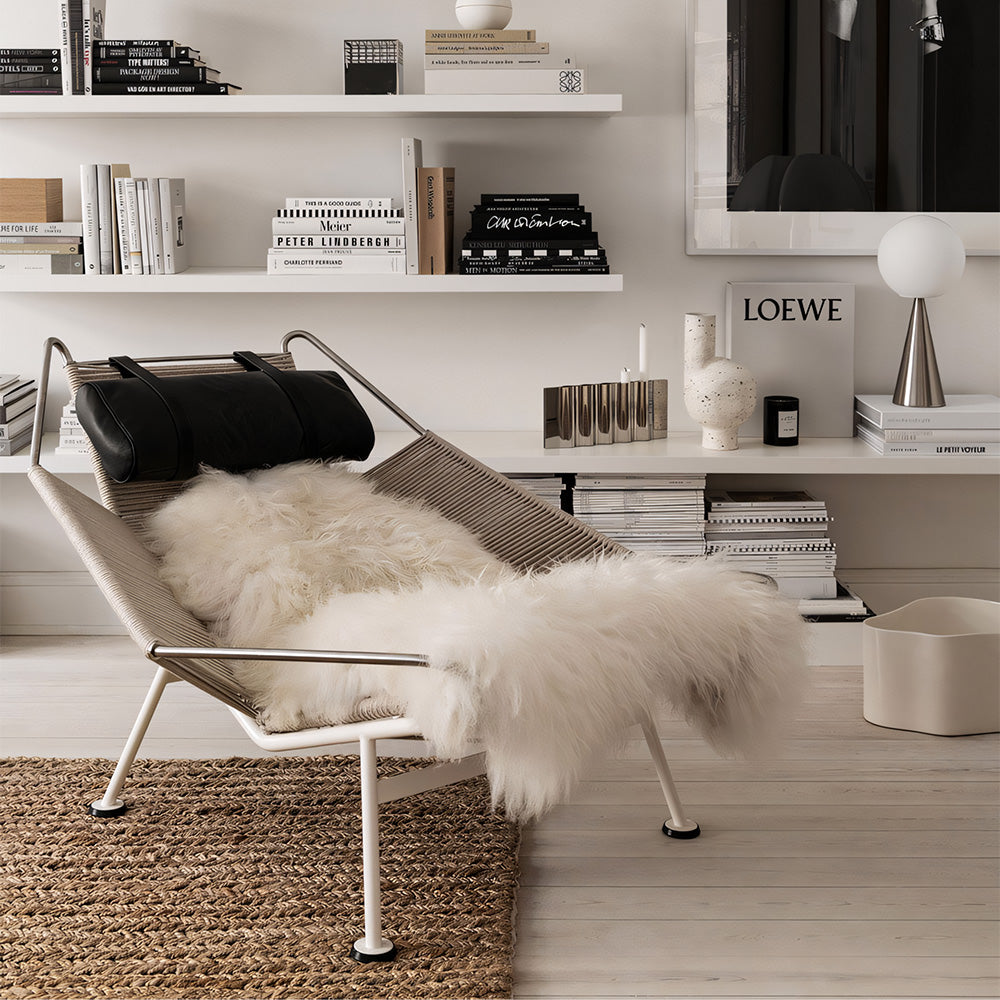 Modern Lounge Chair with Wool Throw and Leather Head Pillow