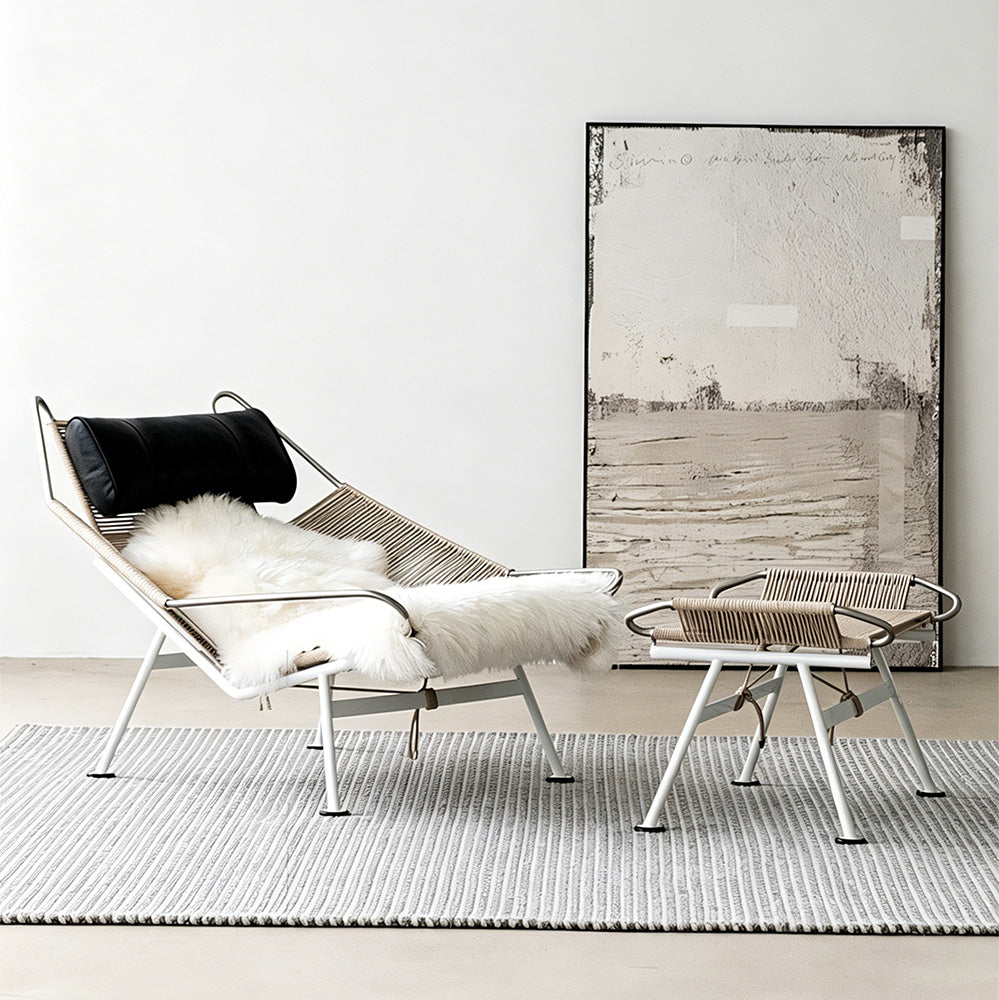 Modern Lounge Chair with Wool Throw and Leather Head Pillow