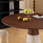 Load image into Gallery viewer, Modern Round Dining Table with Walnut Veneer Top &amp; Travertine-Inspired Pedestal Base
