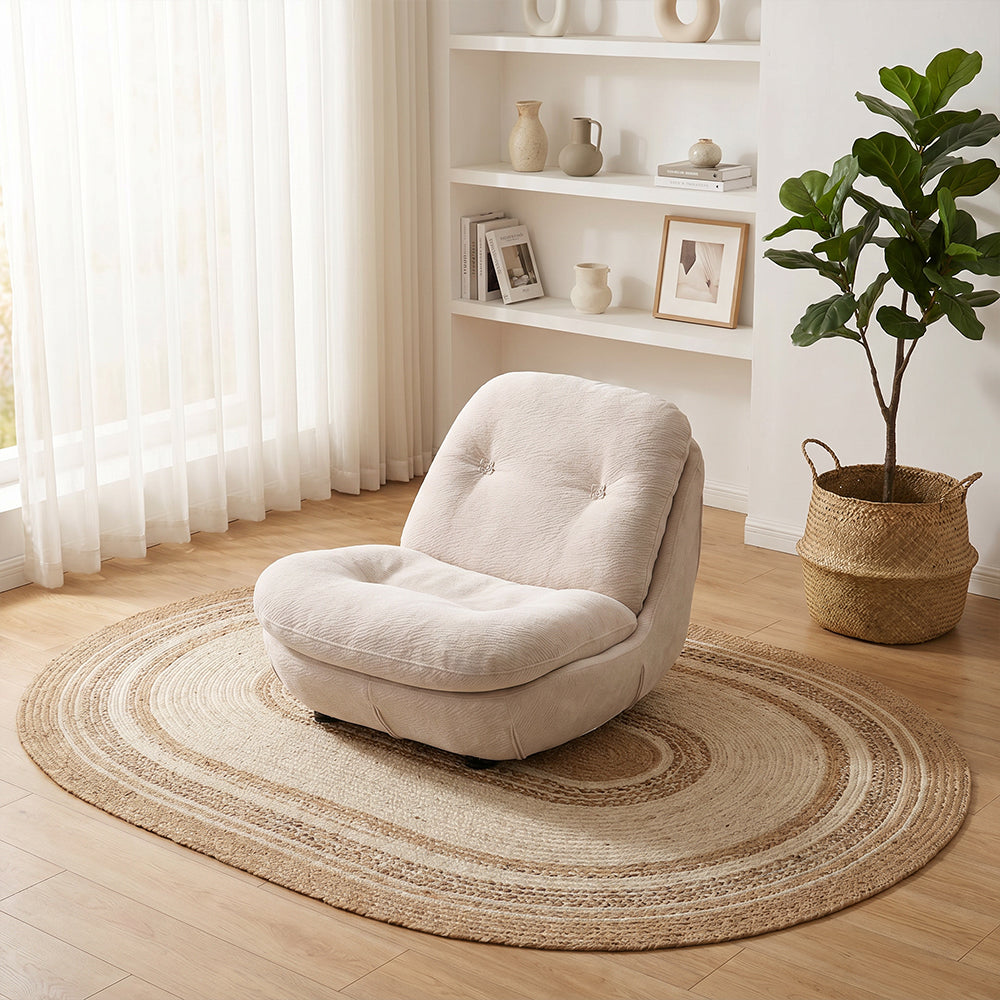 Modern Low Lounge Chair with Plush Cushioning and Rounded Silhouette