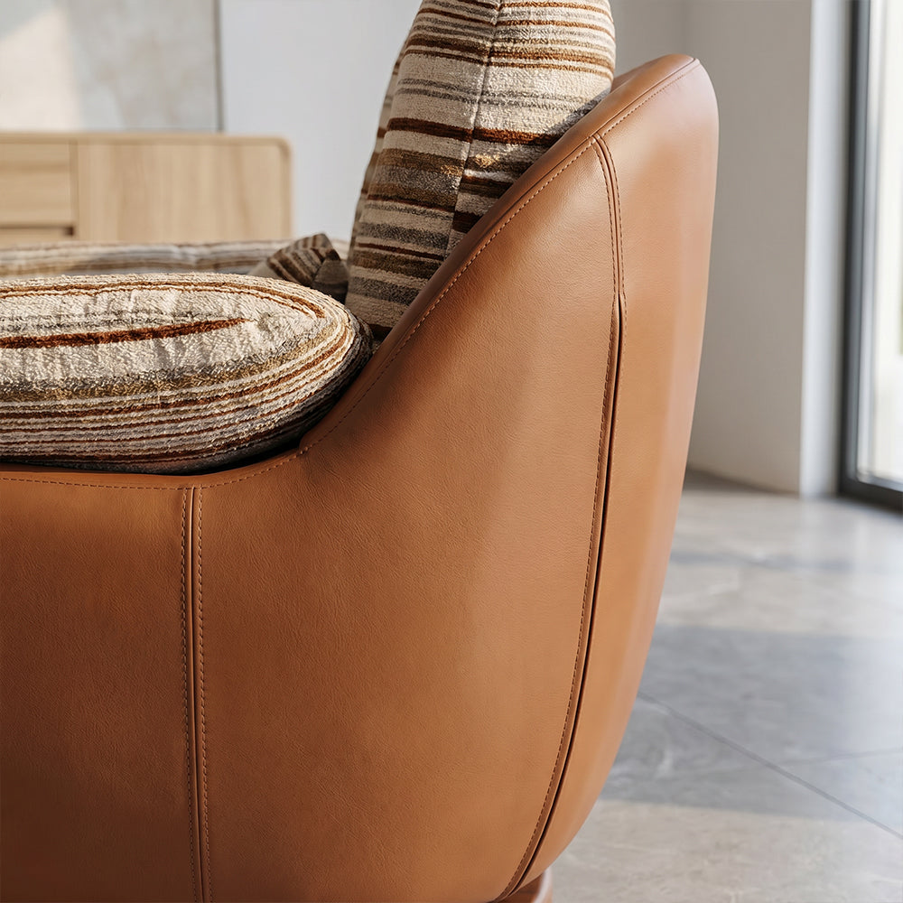 Striped Swivel Lounge Chair with Tan Faux Leather Shell