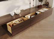 TV stand with concealed storage drawers opened for organized living room storage